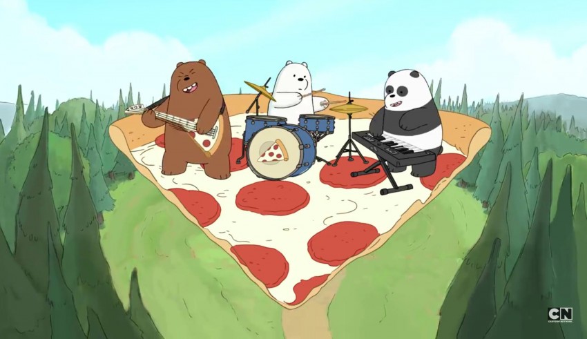 A group of panda bears on top of a slice of pizza.