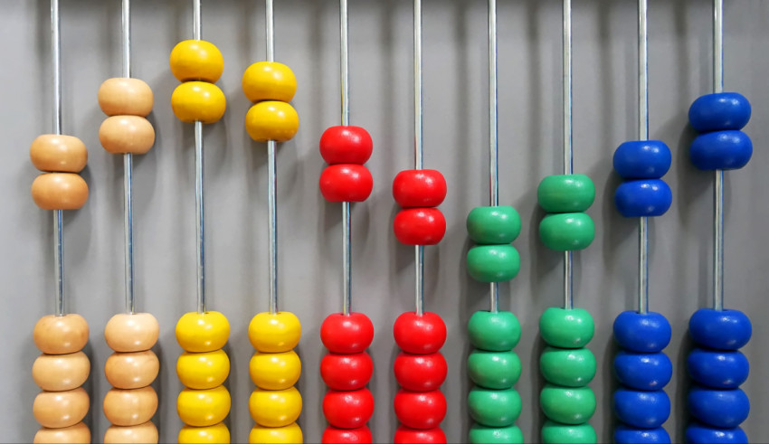 An abacus with colorful beads on it.