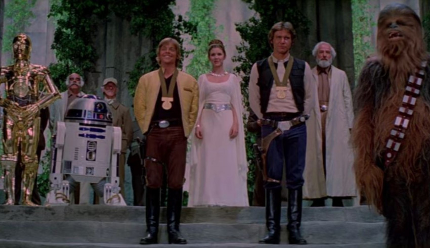 A group of star wars characters standing on steps.