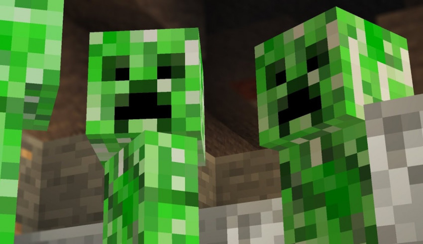 A group of green minecraft creepers are standing next to each other.