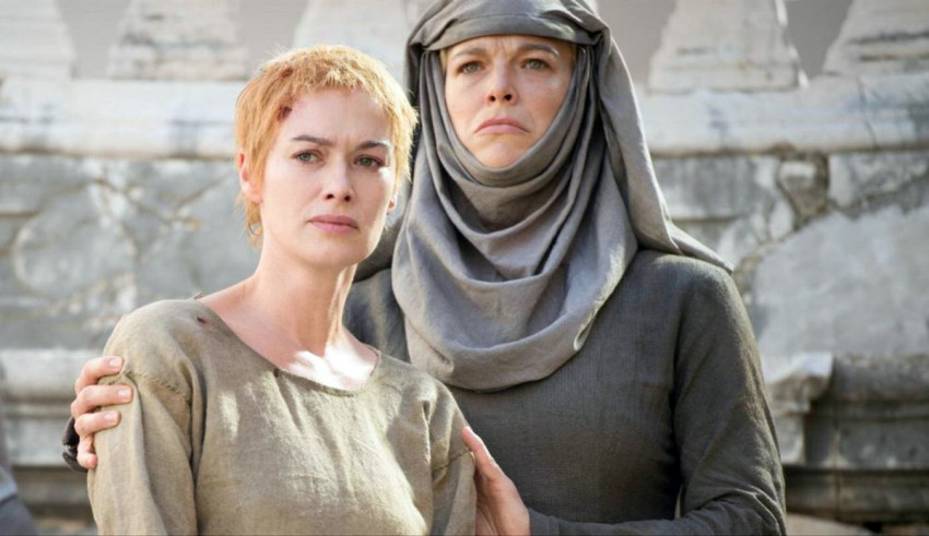 Two women standing next to each other in a scene from game of thrones.