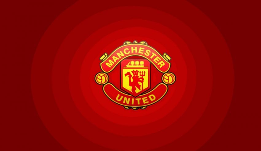 The manchester united logo on a red background.