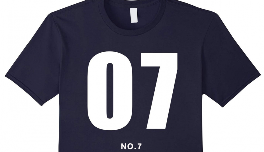 A navy t - shirt with the number 7 on it.