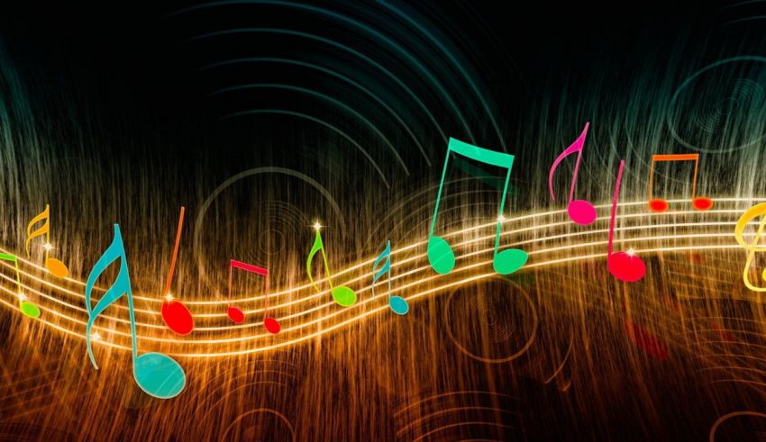 Colorful music notes on a dark background.