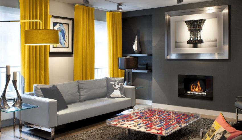 A living room with yellow curtains.