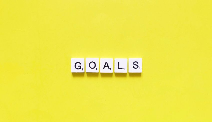 The word goals spelled out on a yellow background.