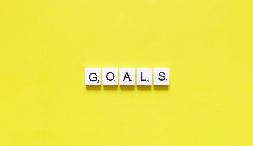 The word goals spelled out on a yellow background.