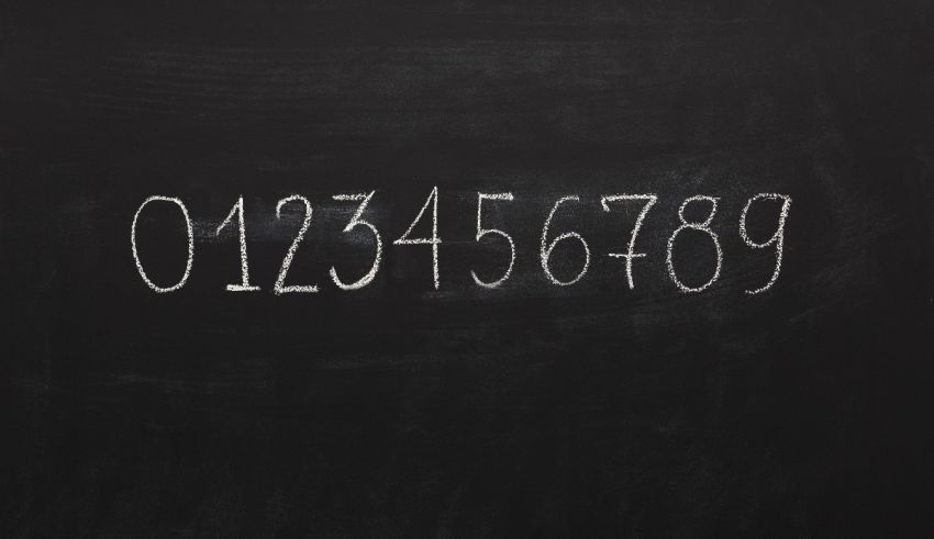 Numbers written in chalk on a blackboard.