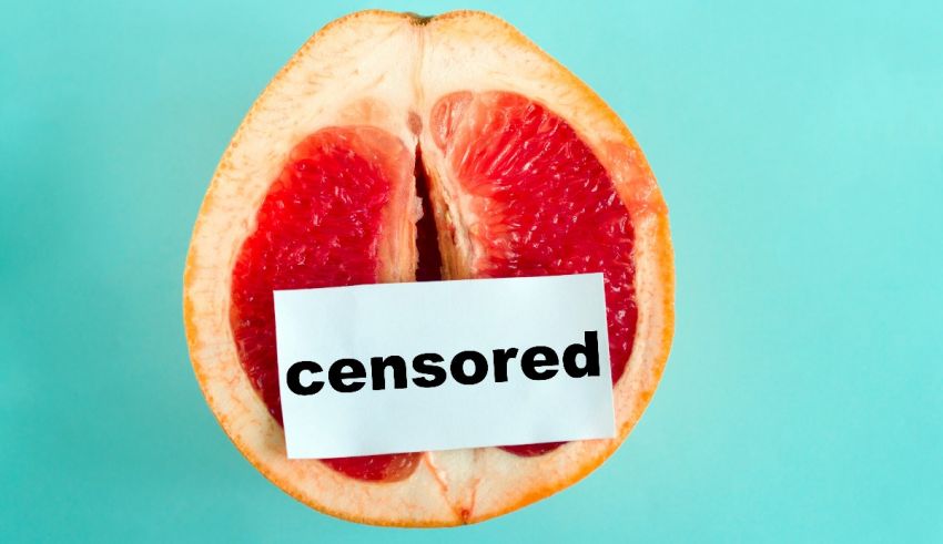 A grapefruit with the word censored on it.