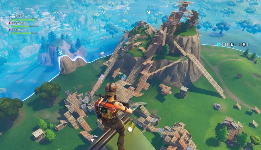 A screenshot of a fortnite player on top of a mountain.