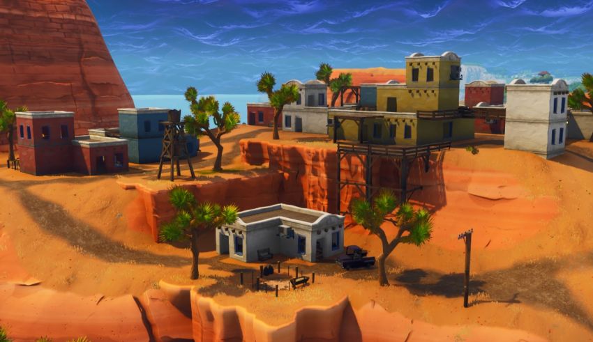 A screenshot of a desert town in fortnite.