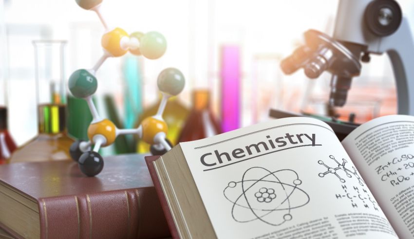 An open book with the word chemistry on it.