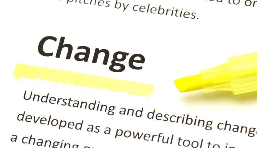 A yellow marker with the word change written on it.