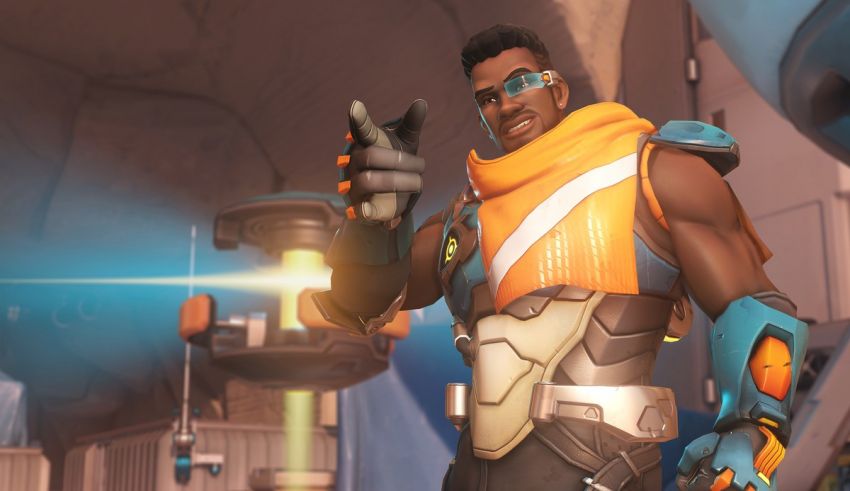 A character in an overwatch game holding a gun.