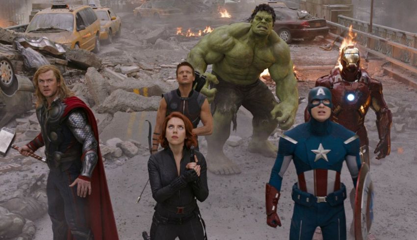 The avengers characters are standing in a city.