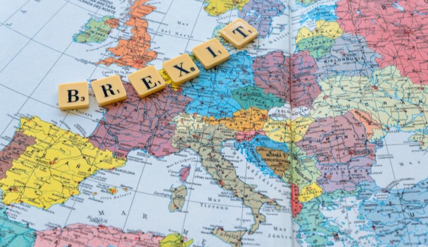 The word brexit is written on a map of europe.