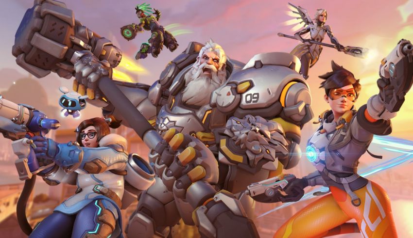 A group of overwatch characters standing in front of a sunset.