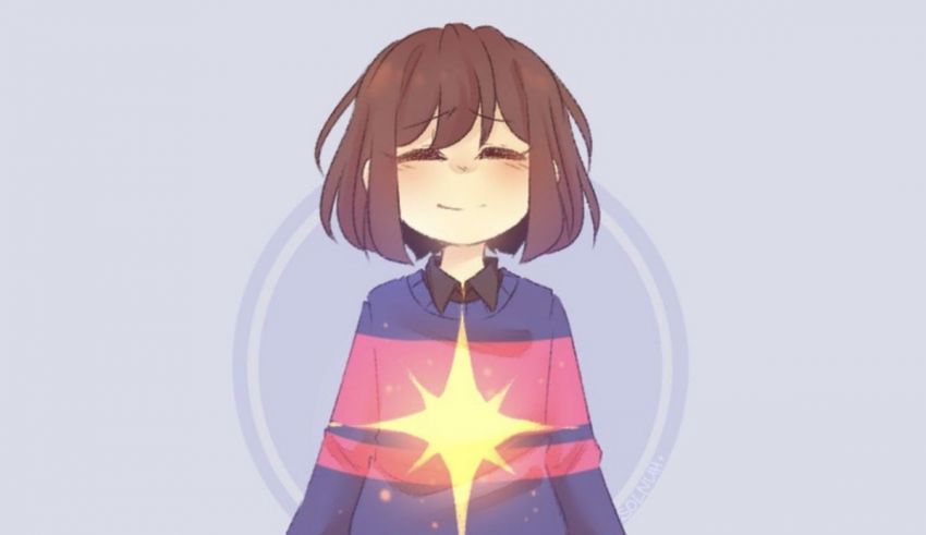 A girl holding a star in her hand.
