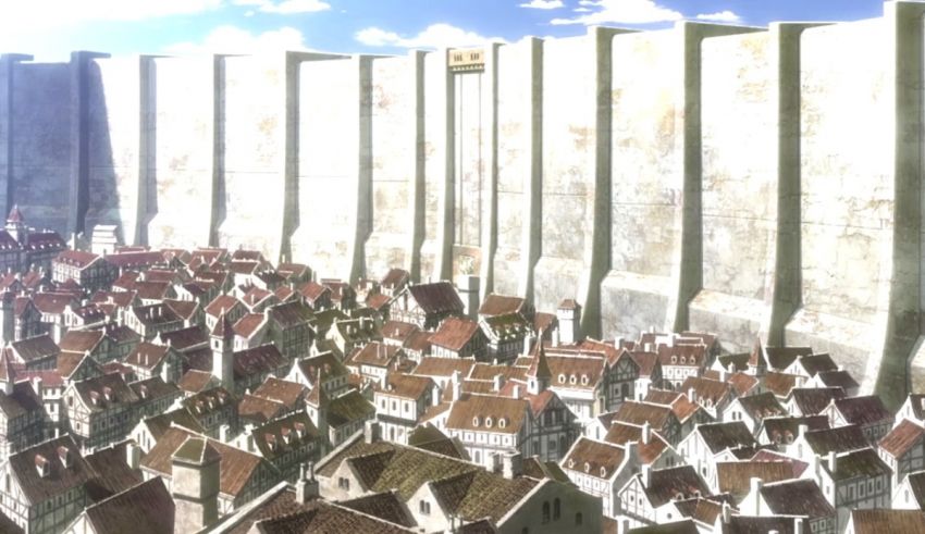 An image of a city with a wall in the background.