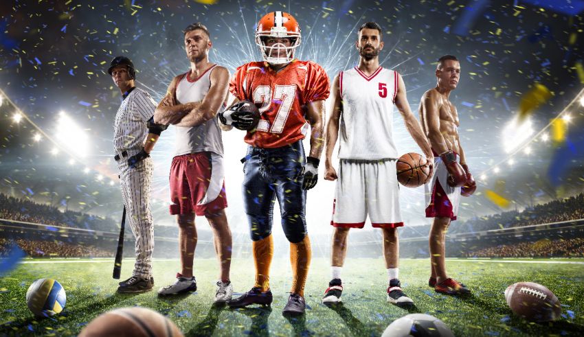 A group of football players posing for a photo.