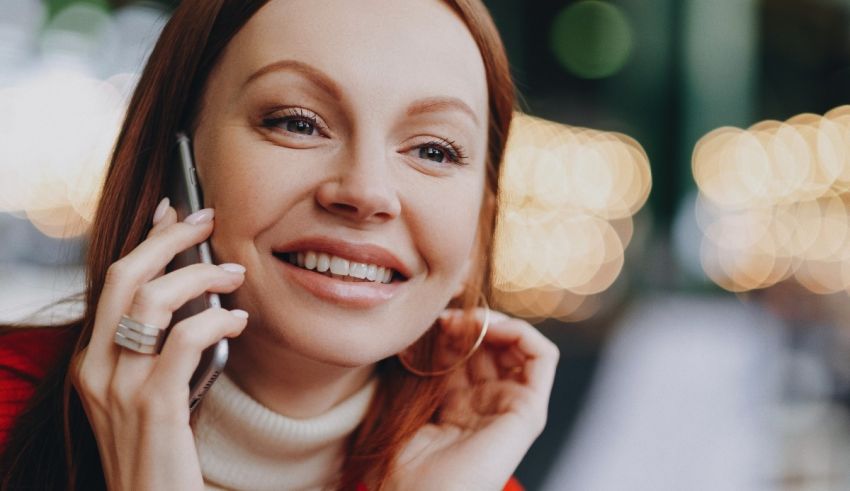 A woman talking on a cell phone.