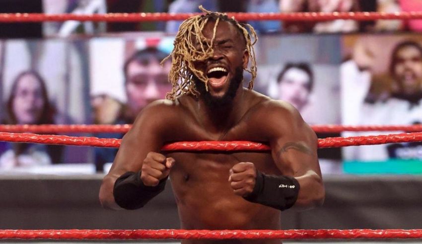 A wrestler with dreadlocks in a wrestling ring.