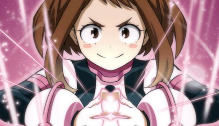 An anime girl holding a pink star in her hand.