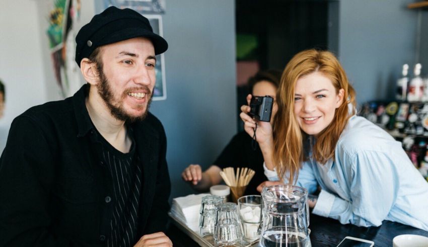 A man and a woman at a coffee shop.