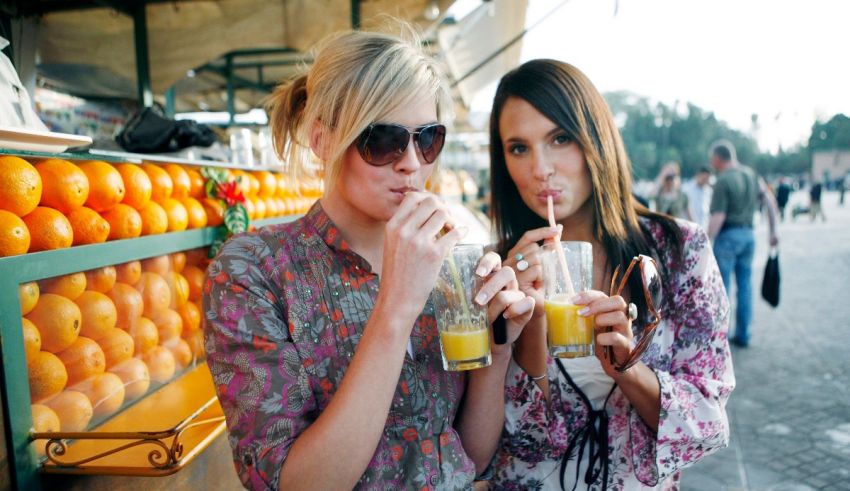 A group of women drinking juice.