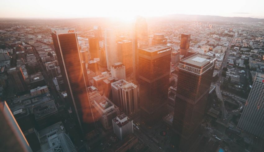 An aerial view of a city at sunset.