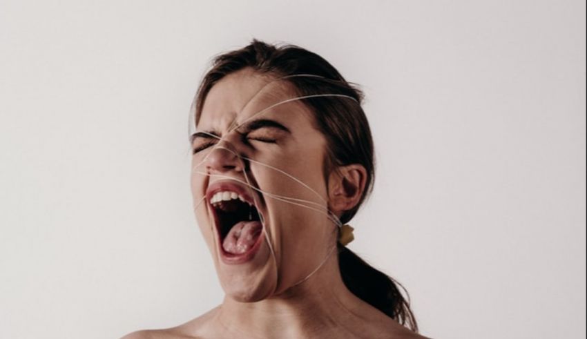 A woman with her mouth open and mouth open.