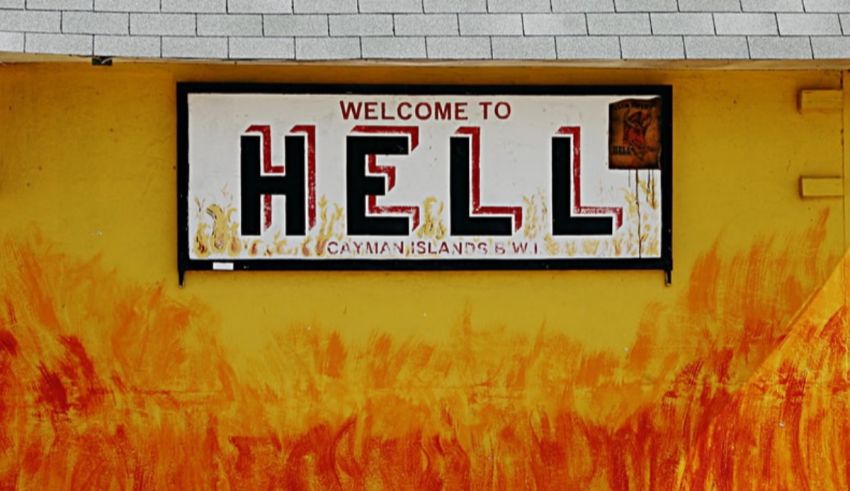 A yellow building with a sign that says hell.