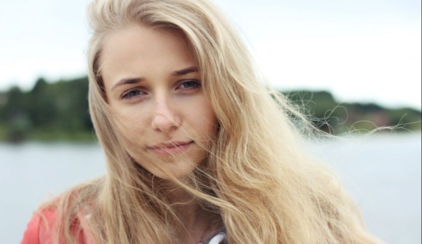 A woman with long blonde hair.