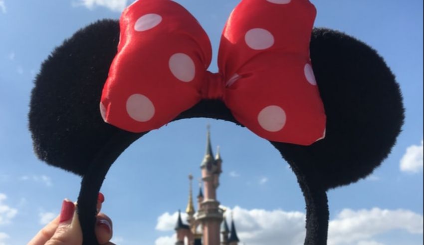 Minnie mouse ears with a castle in the background.