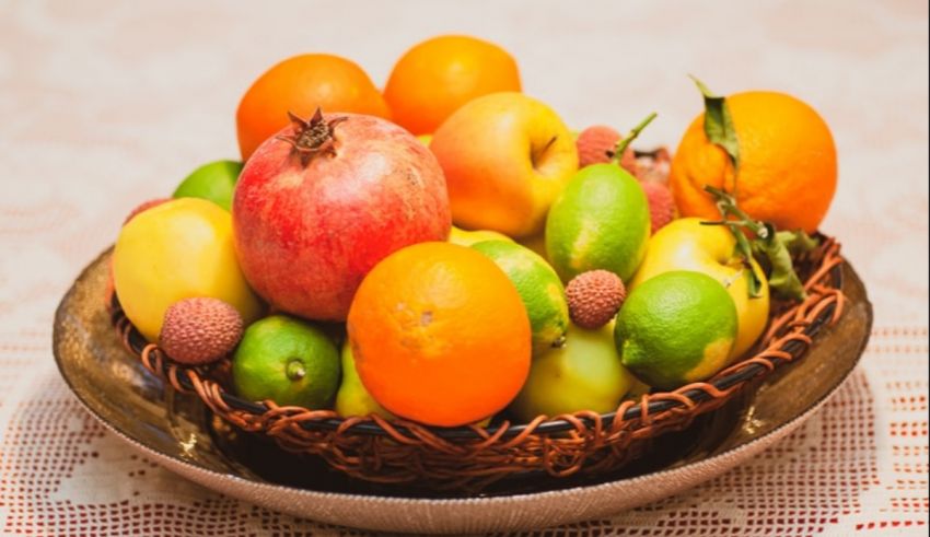 A bowl of fruit on a table.