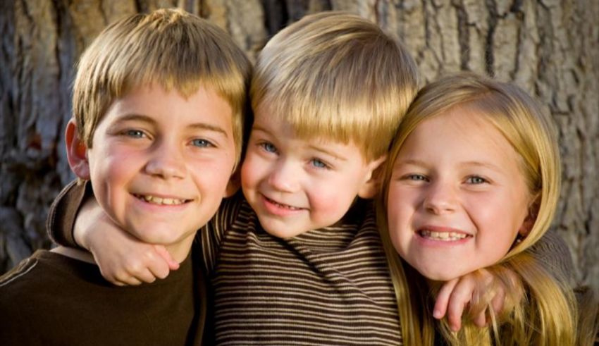 A group of children smiling.