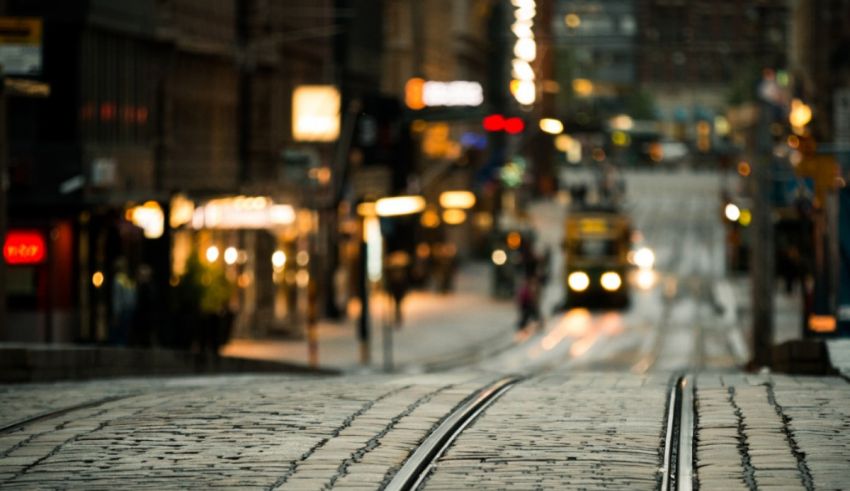 A train tracks on a city street.