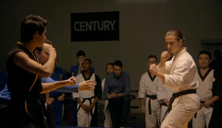 A group of people in a karate class.