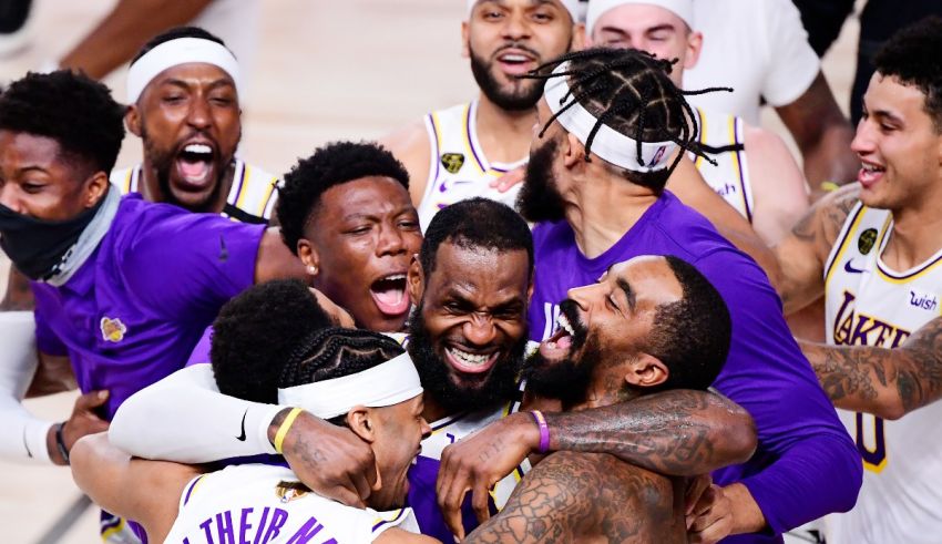 The los angeles lakers celebrate after winning the nba championship.