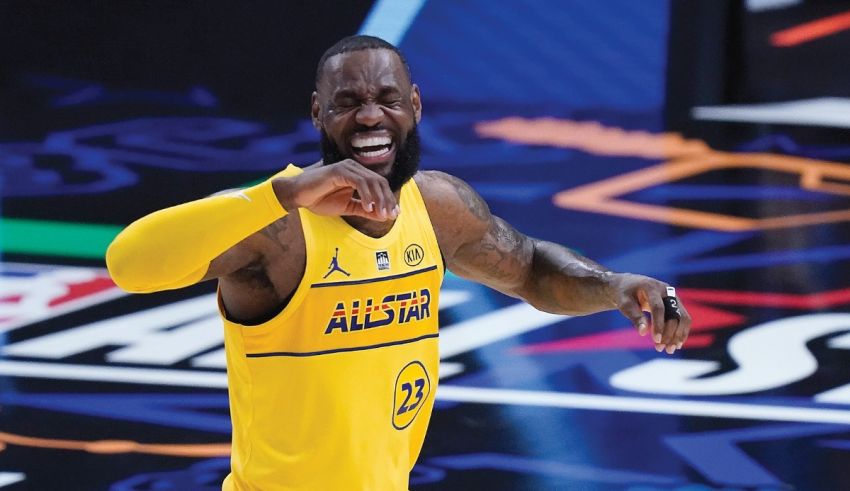 A basketball player is celebrating on the court.