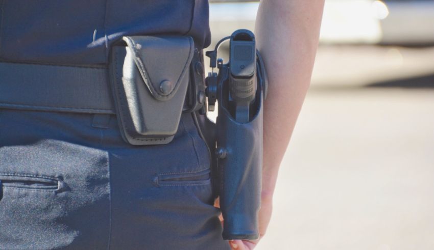 A police officer with a gun in his pocket.