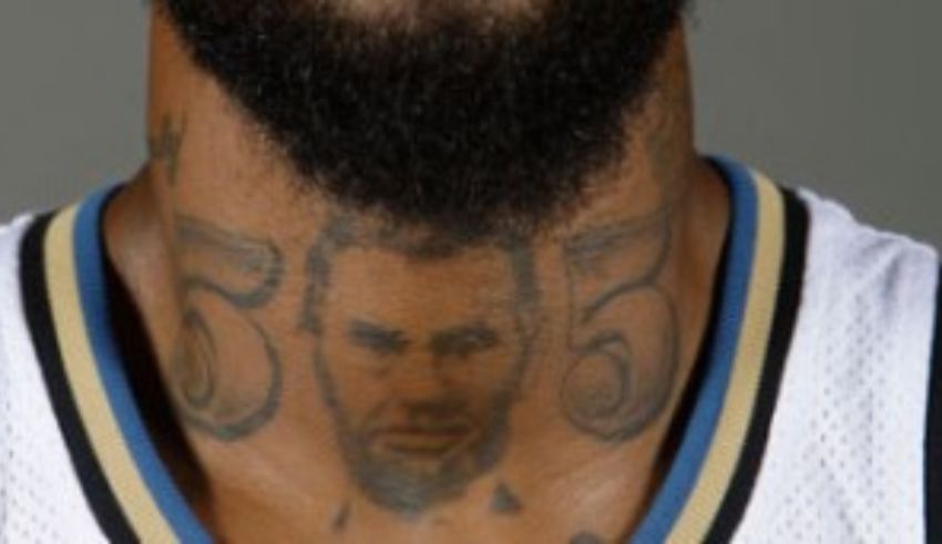 A basketball player with a tattoo on his neck.