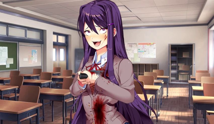 A girl with purple hair holding a cell phone in a classroom.