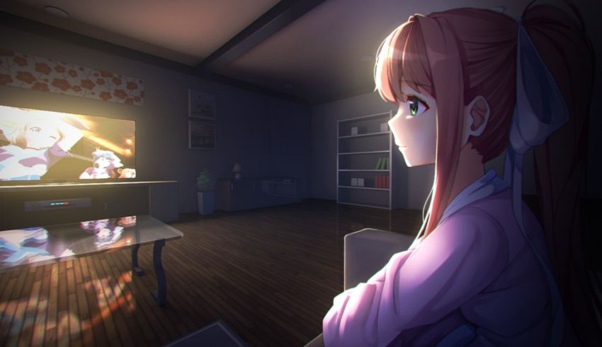 A girl sitting in front of a tv watching anime.