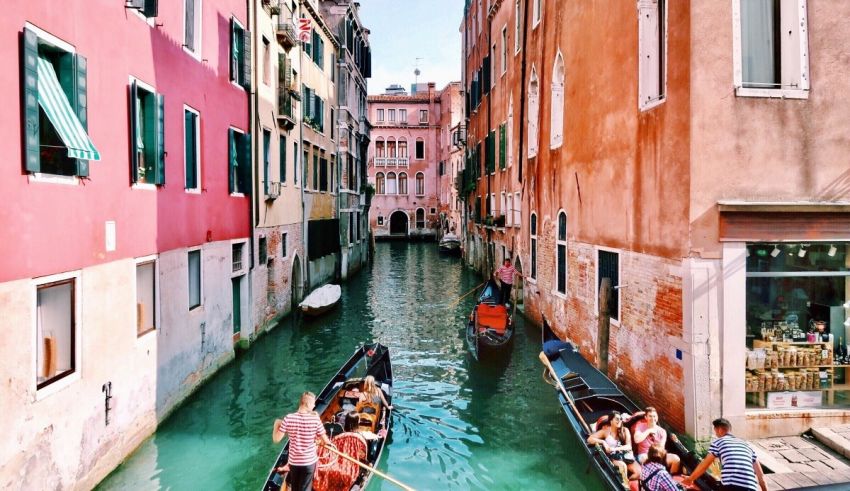 Gondolas on a canal in venice, italy.