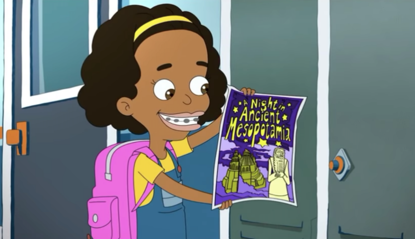 A girl holding a book in front of a locker.