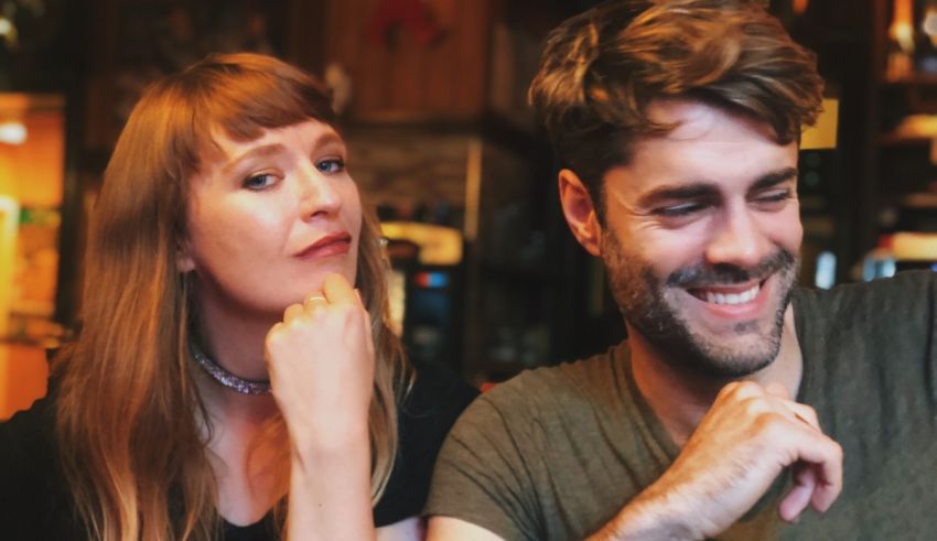 A man and woman sitting together.