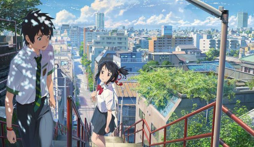 Two anime characters standing on stairs in a city.