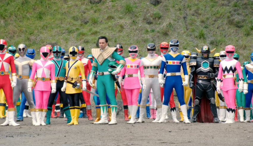 A group of power rangers standing next to each other.