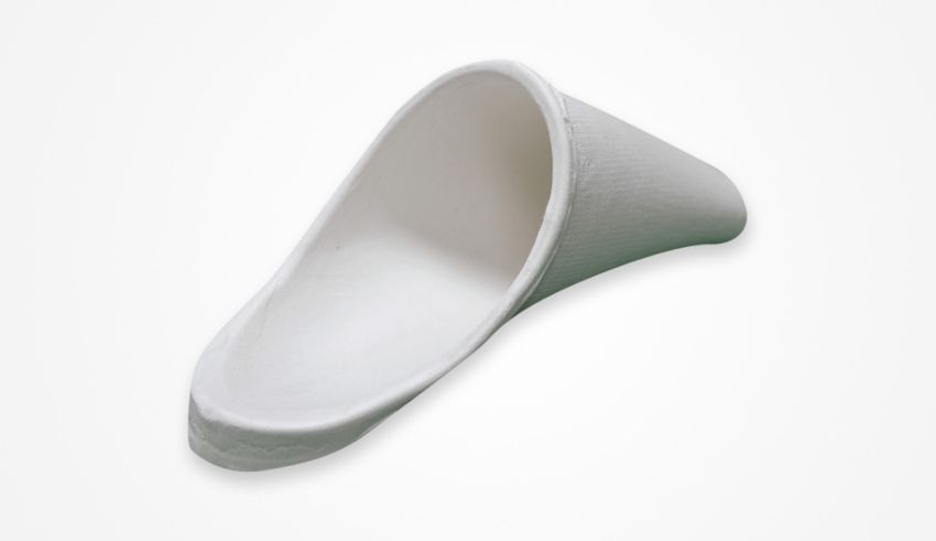 A white plastic shoe on a white background.